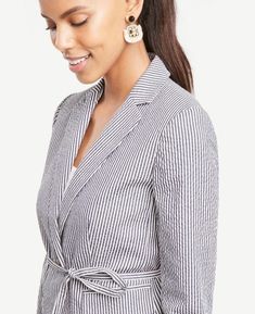 ON SALE FOR A LIMITED TIME Ann Taylor - Petite Seersucker Side Tie Blazer Jacket $159.00  Size: 00P (XXSP) Color: Blue and White Impeccably dressed in seersucker stripes, this belted blazer is a summertime must. Notched lapel. 3/4 sleeves with functional sleeve buttons for added styling options. One-button front. Self tie belt. Front flap besom pockets. Back vent. Lined. Petite: 21 long. Fabric: 97% Cotton, 3% Spandex. LininG: 100% Polyester. New with tags. Spring Striped Blazer For Business Casual, Casual Striped Blazer For Office, Striped Casual Blazer For Business Casual, Striped Spring Business Outerwear, Casual Striped Outerwear For Office, Striped Blazer For Spring Workwear, Casual Tailored Striped Blazer, Tie Blazer, Seersucker Blazer