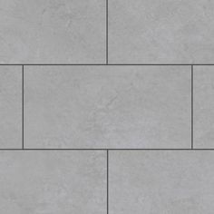 an image of a tile wall that looks like it is made out of grey stone