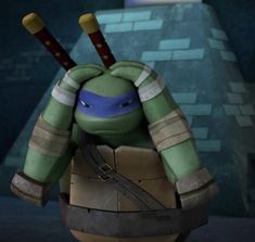 the teenaged ninja turtle is holding two baseball bats