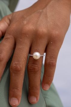 Gift yourself a classic, elegant, and eye-catching ring with the Akoya White Pearl Ring in White Gold with Diamonds. The ring features a lustrous Akoya white pearl with blush pink overtones, a gorgeous diamond halo, and a sleek diamond band. Locally made in Hawaiʻi. Luxury Akoya Pearl White Pearl Ring, Luxury White Akoya Pearl Diamond Ring, Akoya Pearl Ring, White Pearl Ring, Akoya Pearls, Classic Elegant, 14k White Gold Ring, Diamond Band, Diamond Halo