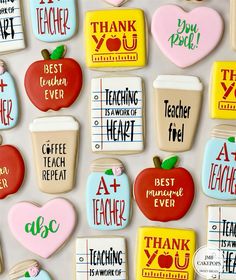 many decorated cookies are arranged in the shape of hearts and apple's with thank you written on them