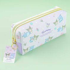 Have fun organizing your fave markers inside this pen case with two separate zippered sections! It’s also decorated with cute illustrations of Kuromi shopping with her sidekick, Baku! Made from synthetic leather Rectangular Pencil Case With Card Slots For School, Cute Stationery With Pen Slots For Everyday Use, Cute Stationery With Pen Slots For Daily Use, Cute Stationery With Pen Slots For Personal Use, Kawaii School Pencil Case With Zipper, Kawaii Bags With Pen Slots For Everyday Use, Kuromi Shopping, Kuromi Pencil Case, Kawaii Pencil Case With Zipper Pouch