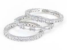 Bella Luce® white diamond simulant 6.29ctw square baguette and round, rhodium over sterling silver ring set. Measures approximately 0.88" L x 0.25" W and is not sizable. The diamond equivalent weight is 3.81ctw. White Baguette Cut Stackable Jewelry, Cubic Zirconia Eternity Band With Baguette Diamonds, Silver Baguette Diamond Promise Ring, Silver Baguette Diamond Jewelry For Promise Ring, Silver Jewelry With Baguette Diamonds In Round Cut, Silver Stackable Baguette Cut Jewelry, Sterling Silver Rings Set, Silver Ring Set, Diamond Alternatives