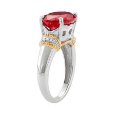 Expect compliments when you don this stunning lab-created ruby and diamond accent ring. Click on this JEWELRY & WATCHES GUIDE to learn about fit, styles, materials and more!RING DETAILS Width: 0.40 in. Metal: sterling silver Plating: 14k gold, rhodium STONE DETAILS Stone type: lab-created ruby Total weight: 6 ct. Shape: oval Setting: prong DIAMOND DETAILS Total weight: less than 1/10 ct. Shape: single cut Color grade: I-J Clarity: I2-I3 Setting: pave Gemstones may have been treated to enhance th Classic Ruby Ring With Gemstone Accents For Promise, Lab-created Ruby Promise Ring With Diamond Accents, Anniversary Ruby Birthstone Ring With Gemstone Accents, Cubic Zirconia Ruby Ring With Gemstone Accents For Anniversary, Lab-created Ruby Ring With Diamond Accents As Gift, Lab-created Ruby Rings With Diamond Accents For Gift, Gift Ring With Diamond Accents And Lab-created Ruby, Fine Jewelry Rings With Lab-created Ruby And Accent Stones, Diamond Ruby Ring With Gemstone Accents For Anniversary