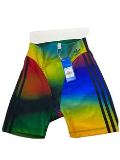 Enhance your cycling performance with these Adidas Original GD2493 women's Multicolor Paolina Russo tight bike shorts in size 30. The athletic fit provides comfort, while the multicolor design adds a touch of style to your activewear collection. These shorts are perfect for all seasons, whether it's summer, fall or spring. Crafted with high-quality materials in Cambodia, these shorts are suitable for women of all sizes. The shorts feature a unique theme of bike riding, making them perfect for cy Multicolor Activewear With Built-in Shorts, Fitted Color Block Shorts, Color Block Fitted Short Bottoms, Fitted Color Block Short Bottoms, Sporty High Waist Multicolor Bottoms, Multicolor Athleisure Bottoms With Built-in Shorts, Sporty Multicolor Bottoms With Built-in Shorts, Multicolor Workout Shorts, Fitted Multicolor Shorts