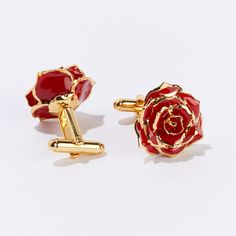 "Say \"I love you,\" with our Burgundy Bliss Eternal Cufflinks. Delicately framed in gold, this perfectly preserved pair of wearable real roses symbolize everlasting love, passion, and desire. Timeless and vibrant, red roses are the right choice for every occasion. The object of your affection will enjoy wearing your stylish and meaningful gift and think of your sweet sentiments forever. Revealed in the rich details of each pair of Eternal Cufflinks is the expert craftsmanship of our skilled art Elegant Red Cufflinks For Formal Occasions, Elegant Formal Jewelry With Rose Details, Elegant Formal Jewelry With Roses, Classic Rose Design Jewelry For Gifts, Rose Gold Jewelry For Formal Occasions And Gifts, Elegant Rose Design Jewelry For Formal Occasions, Elegant Formal Jewelry With Rose Design, Rose Gold Jewelry With Roses For Formal Occasions, Elegant Rose Gold Cufflinks For Business