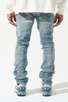 The SERENEDE® "IMPERIAL" straight leg jeans feature a vintage blue wash, rip-and-repair details with a distressed finish along both legs. Complete with SERENEDE® branded hardware, a signature "leather" waistband label, and classic five-pocket styling, these jeans deliver both function and fashion. Key Features:Vintage blue washDistressed finish Rip and repair finishSignature "leather" waistband labelSERENEDE® branded hardwareFive-pocket stylingTrue-to-size waist with a classic straight fitZipper fly Fit Information:True-to-size waistStraight-leg fit (classic straight fit throughout leg.) Model is 5'4" ft, 140 Ibs wearing a size 28. Designed in California and imported, the "IMPERIAL" straight leg jeans are your go-to for effortless, standout style. Faded Vintage Rigid Denim Jeans, Vintage Faded Rigid Denim Jeans, Faded Pre-washed Jeans For Streetwear, Rigid Denim Jeans With Contrast Stitching, Standard Cut, Pre-washed Straight Leg Rigid Denim Jeans, Baggy Shorts, Leg Model, Kids Shorts, Straight Leg Jeans