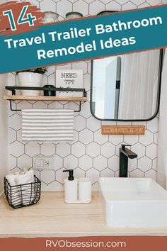 the bathroom is decorated with white tile and black accents, including a wooden shelf above the sink