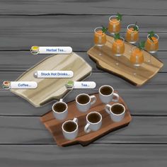 two trays filled with drinks next to each other on top of a wooden table