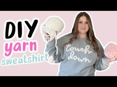 a woman holding two balls of yarn in one hand and the words diy yarn sweatshirt on the other