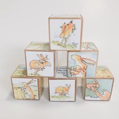 six wooden blocks with pictures of animals on them