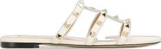 Elegant Studded Sandals For Spring, Studded Flat Heel Sandals, Chic Flat Sandals With Studded Rubber Outsoles, Rockstud Flats, Sandals White, Flat Sandals, Valentino Garavani, Leather Sandals, Calf Leather