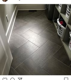 an image of a bathroom with tile flooring