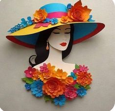 a woman wearing a colorful hat with flowers on her chest and hair in the shape of a flower