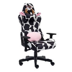 a black and white chair with a pink cow print seat cover on top of it