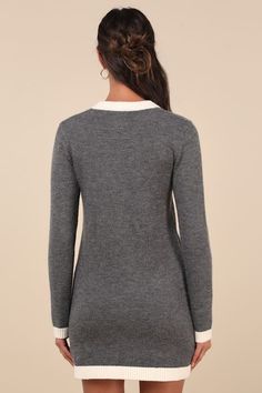 From office afternoons to dressy dates, the Lulus Sophisticatedly Cozy Grey and Ivory Button-Up Sweater Mini Dress is a perfect option! Soft and stretchy sweater knit shapes long sleeves and a crew neckline, both with contrasting ivory ribbed knit trim. A functional button placket secures at the front, with embossed gold buttons for a decadent effect. Two functional patch pockets boast matching decorative buttons, atop a mini hem. Matching contrast trim accents the pockets and hem. Fit: This garment fits true to size. Length: Mid-thigh. Size medium measures 31.5" from shoulder to hem. Bust: Great for any cup size. Waist: Loosely Fitted. Hip: Loosely Fitted. Undergarments: May be worn with any standard bra. Fabric: Fabric is very stretchy. Unlined. 52% Acrylic, 28% Nylon, 20% Polyester. Han Sweater Mini Dress, Ivory Dress, Ivory Dresses, Mini Sweater Dress, Decorative Buttons, Knit Mini Dress, Button Dress, Sweater Knit, Contrast Trim