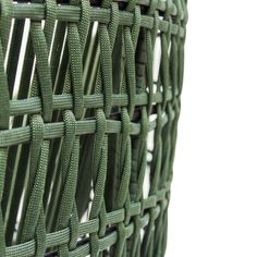 a close up view of a green woven material