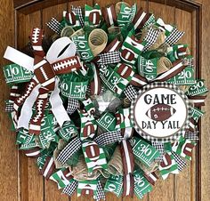 a football wreath with game day decorations on it