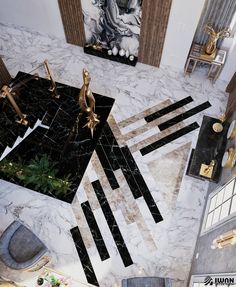 an aerial view of a living room with black and white marble floors, gold accents