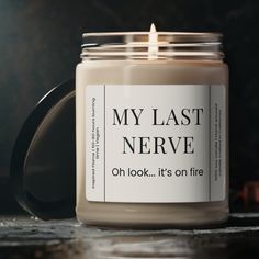 a candle with the words, my last nerve on it's front