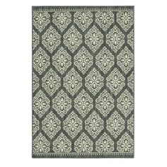 a gray and white rug with an intricate design