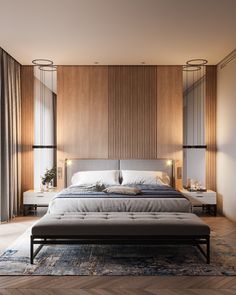 a large bed sitting in the middle of a bedroom next to a tall wooden wall