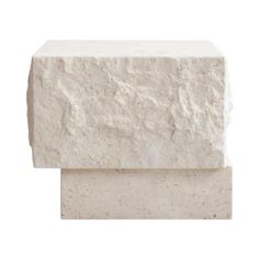 a white stone block on a white background