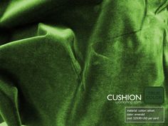 a close up of a green cloth with the words cushion true color written below it