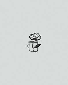 a black and white drawing of a coffee cup with a flower in it's center