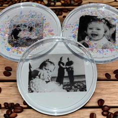 two glass plates with photos on them next to coffee beans