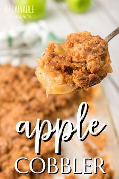 an apple cobbler on a spoon with the title overlay above it that says, apples cobbler