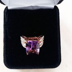 Amethyst Ring 10k Gold Genuine With Certificate One Ladies Ring With Genuine Natural Color Diamonds And Amethysts Well Made In Solid Rose Gold . Total Item Width 13 Mm ,Height 9.5mm. Good Workmanship Stamped :10k. Gemstone Info: One Emerald Shaped Amethysts Weighing Approx.6.20ctw Color: Purple Clarity: Clean Thirty Four Round Shape Diamonds Weighing Approx.0.17ctw Color H-I Clarity:I1-I2 Total Weight Of Gemstones: 6.37 Ctw Total Item Weight: 5.3g Total Estimated Retail Value $1,490 Usd Conditio Formal Rose Gold Amethyst Ring With Gemstone Accents, Luxury Amethyst Ring Emerald Cut, Luxury Emerald Cut Amethyst Ring, Luxury Purple Ring Jewelry, Luxury Purple Jewelry Ring, Rose Gold Amethyst Ring With Gemstone Accents For Anniversary, Luxury Purple Jewelry With Accent Stones, Luxury Rose Gold Amethyst Ring, Hallmarked Emerald Cut Amethyst Ring For Formal Occasions