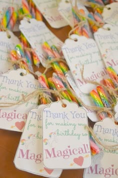 many tags are tied together with twine to give them as favors for a birthday party