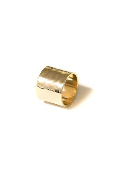 Cigar band ring in hammered brass, plated in 18k gold. This chunky ring style runs small, we recommend ordering up one size. Dimensions: A little over 1/2" (Approximately 1.5 cm, 16mm) Materials: Brass, 18k Gold Plating Ships in a branded jewelry pouch and box, perfect for gift giving! Gold Thick Band Ring Tarnish Resistant, Everyday Tarnish Resistant Wide Band Ring, Adjustable Gold Wide Band Ring, Minimalist Hammered Wide Band Ring, Hammered Wide Band Rings For Everyday, Modern Wide Band Ring With Hammered Detail, Everyday Gold Wide Band Ring With Open Shape, Hammered Yellow Gold Wide Open Band Ring, Hammered Yellow Gold Wide Band Open Ring