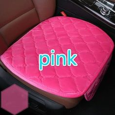 pink seat cover with the word pink on it