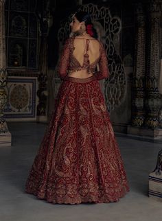 Make a stunning statement in this red raw silk lehenga choli set, featuring antique kasab embroidery in contrasting resham tones, enhanced with dabka, beads, sequins, and crystals. It comes with a second worked dupatta. Wine Colour Lehenga Bridal, White Indian Suit, Wine Colour Lehenga, Kasab Embroidery, Red Bridal Lehenga, Embroidered Bridal Lehenga, Dabka Work, Red Dupatta, Wine Colour