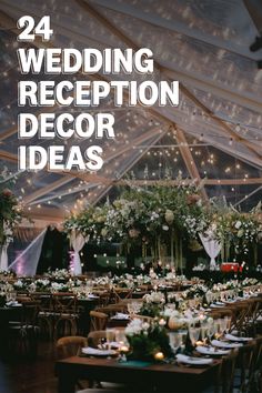 an indoor wedding reception with white flowers and greenery on the tables, surrounded by string lights