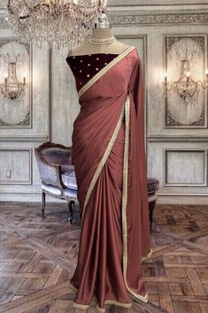 Beautiful light sangria satin georgette saree with unstitched maroon velvet blouse piece. Elegant Draped Saree With Resham Embroidery, Elegant Draped Unstitched Saree, Draped Georgette Saree With Dupatta, Elegant Draped Dupatta For Festivals, Elegant Draped Georgette Traditional Wear, Georgette Draped Saree With Dupatta, Elegant Draped Traditional Wear In Georgette, Formal Saree With Resham Embroidery For Navratri, Formal Resham Embroidery Floor-length Saree