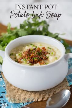 instant pot potato leek soup in a white bowl with spoons and parsley on the side