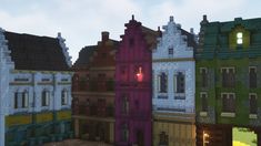 several different colored buildings are shown in this screenshot from the video game minecraft