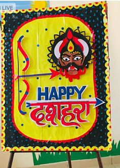 a sign that says happy navras with an arrow in the middle and a man's face painted on it