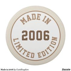 the made in 2006 badge is shown on a white background and has brown lettering that reads made in 2006