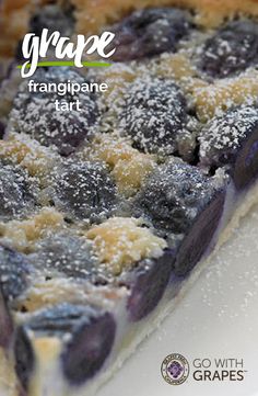 a close up of a blueberry pie on a plate