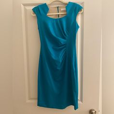 Never Worn Sadly, No Tags! More Turquoise Color Fitted Knee-length Turquoise Dress, Elegant Sleeveless Midi Dress In Turquoise, Elegant Turquoise Sleeveless Midi Dress, Fitted Ruched Turquoise Dresses, Elegant Sleeveless Turquoise Midi Dress, Fitted Turquoise Elegant Mini Dress, Chic Turquoise Fitted Midi Dress, Turquoise Fitted Midi Dress Chic, Fitted Sleeveless Turquoise Midi Dress