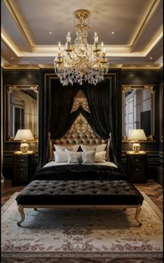 a bedroom with a bed, chandelier and two lamps