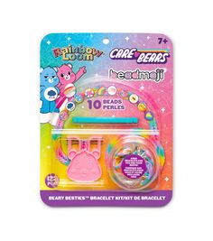 the care bears toothbrush and brush set is packaged in pink, with an assortment of accessories