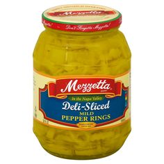 a jar of pickled pepper rings on a white background with the words mergetta deli - sliced