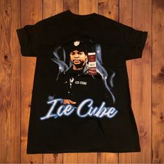 Up For Sale Today Is An Ice Cube Shirt Measures 16.5 Inches Pit To Pit And 27 Inches Length! Condition Is 10/10, Brand New With Tags If You Have Any Questions Please Feel Free To Message Me! Thank You So Much For Looking! Check Out My Page For More And We Can Bundle Up Cool Graphic Print Tops For Streetwear, Urban Fitted Shirt For Streetwear, Fan Apparel Tops With Sublimation Print For Streetwear, Fitted Logo Print Shirt For Streetwear, Fitted Shirt With Sublimation Print For Streetwear, Cube Graffiti, Ice Cube Shirt, Green Day Revolution Radio, Graffiti Shirt