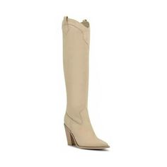 Complement your western chic look by wearing the Nine West Kliva 2 knee-high boots that are designed on a cowboy-inspired silhouette. Suede upper. Man-made and textile lining. Cushioned insole. Zippered side closure. Pointed toe. High block heel. Pull loops on the side. Man-made outsole. Measurements:Heel height: 3.54 inShaft circumference: 14 in Size: Women 9.  Color: Beige.  Gender: female.  Age Group: adult. Western Style Knee-high Boots For Spring, Fitted Cream Boots For Rodeo, Spring Western Style Knee-high Boots, Cream Western Boots For Fall, Spring Knee-high Heeled Boots For Ranch, Spring Wide Calf Knee-high Boots For Ranch, Cream Boots For Western-themed Spring Events, Cream Boots For Spring Western-themed Events, Beige Knee-high Heeled Boots With Wide Calf