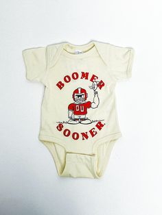 OU KIDS OU football player onesie natural Onesie | Lush Fashion Lounge Trendy Oklahoma University Sooners Apparel & Cute Gameday T-Shirts Ou Football, Natural Newborn, The University Of Oklahoma, University Of Oklahoma, Nature Kids, Women's Boutique, Football Player, Oklahoma City, Ladies Boutique